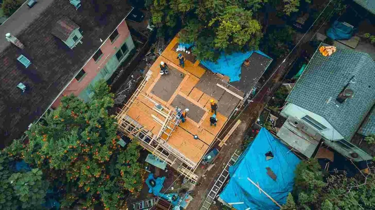 Apex Roofers shingle flat roof top view